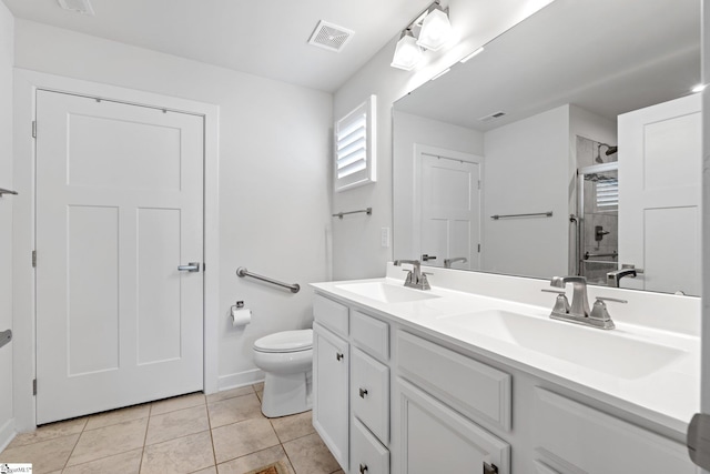 5 Timberwild Dr, Greenville, SC 29605 - bathroom with a shower stall, toilet, tile patterned flooring, double vanity, and baseboards