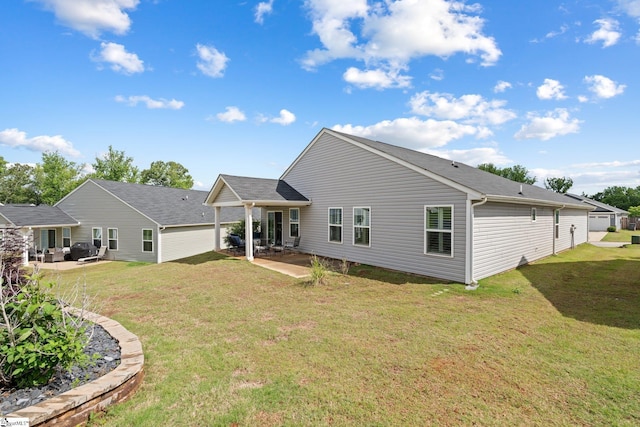 5 Timberwild Dr, Greenville, SC 29605 - back of house with a patio and a lawn