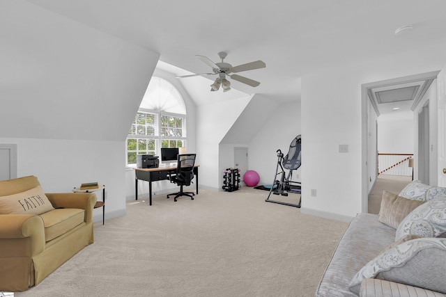 home office with lofted ceiling, ceiling fan, carpet floors, and attic access
