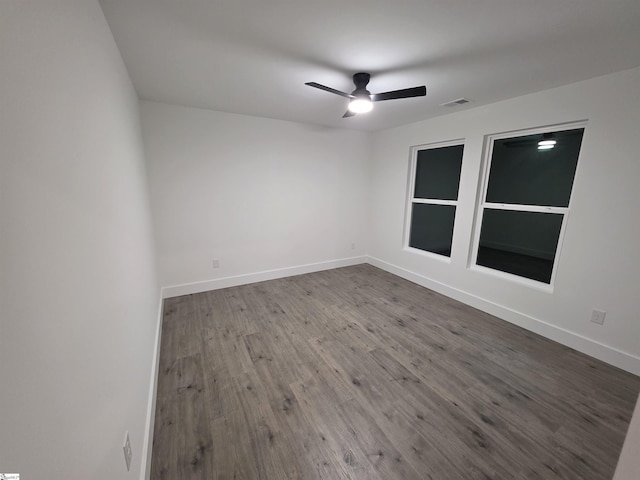 402 Edgewater Dr, Anderson, SC 29626 - empty room with dark wood-style flooring, ceiling fan, and baseboards