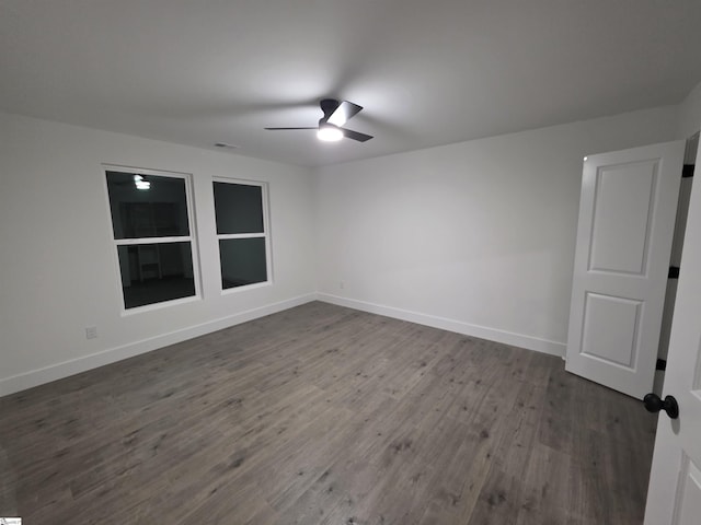 402 Edgewater Dr, Anderson, SC 29626 - unfurnished room featuring ceiling fan, dark wood-style floors, and baseboards