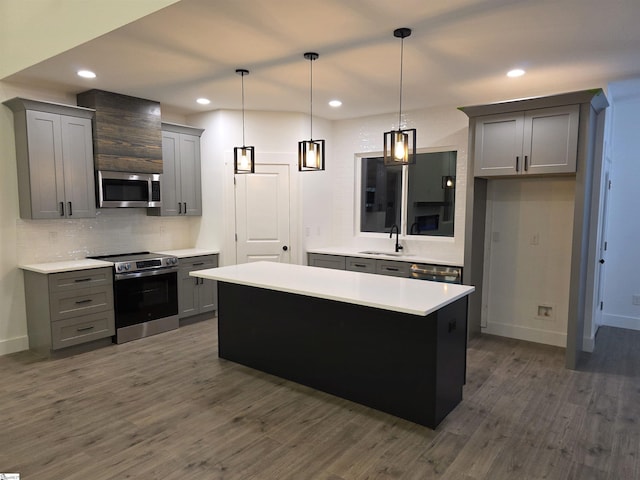402 Edgewater Dr, Anderson, SC 29626 - kitchen with appliances with stainless steel finishes, gray cabinetry, baseboards, tasteful backsplash, and light countertops