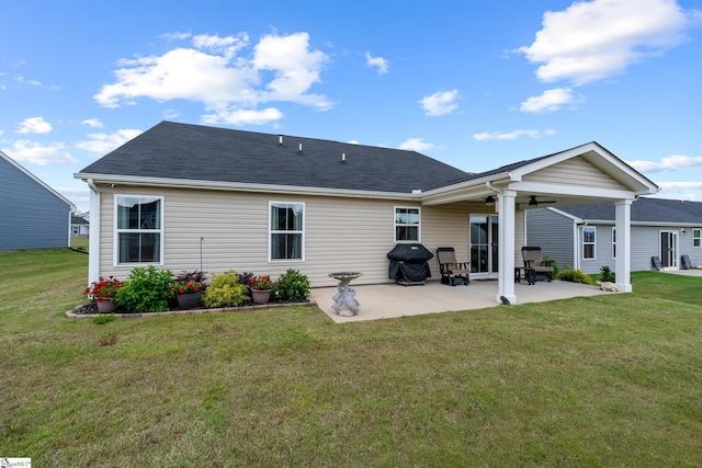 203 Bending Branch Rd, Greenville, SC 29605 - rear view of house with ceiling fan, a patio area, a lawn, and a shingled roof