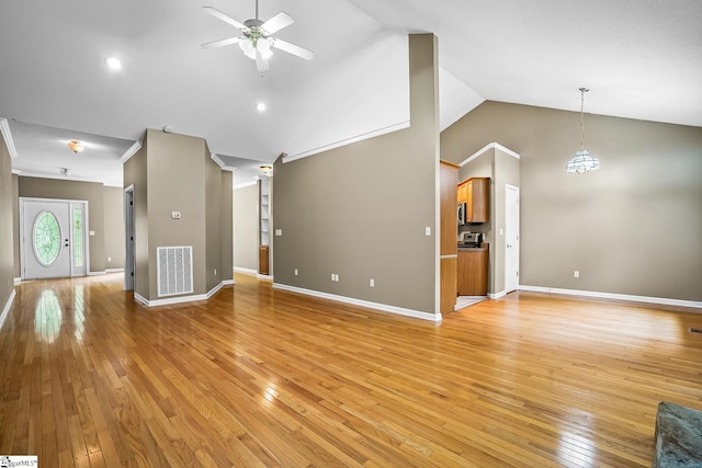 1298 Moorehead Pl, Pendleton, SC 29670 - unfurnished living room featuring ceiling fan, light wood-type flooring, baseboards, crown molding, and high vaulted ceiling