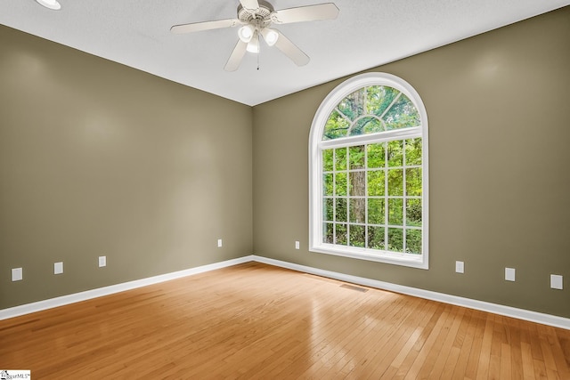 1298 Moorehead Pl, Pendleton, SC 29670 - spare room featuring baseboards, light wood-type flooring, and a ceiling fan