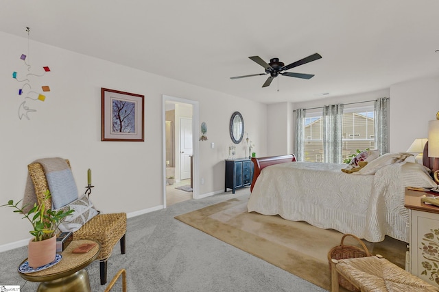 305 Yellow Fox Rd, Greer, SC 29650 - carpeted bedroom with baseboards, ceiling fan, and connected bathroom