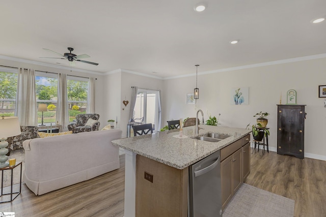 305 Yellow Fox Rd, Greer, SC 29650 - kitchen with open floor plan, a sink, stainless steel dishwasher, light wood-style floors, and crown molding