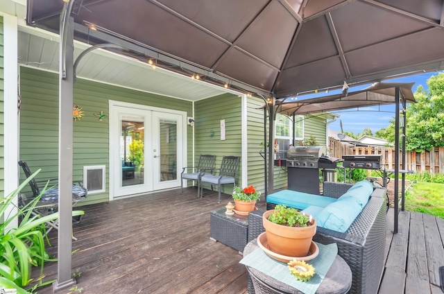 239 Walcott Dr, Lyman, SC 29365 - wooden deck with french doors, a gazebo, fence, and grilling area