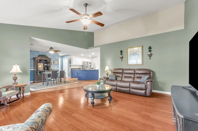 239 Walcott Dr, Lyman, SC 29365 - living room with a ceiling fan, baseboards, light wood-type flooring, and lofted ceiling