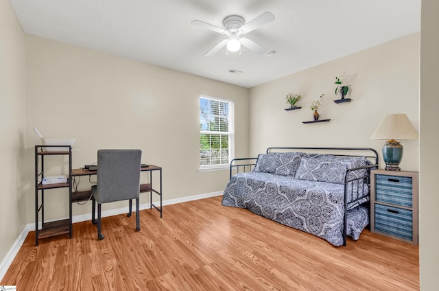 239 Walcott Dr, Lyman, SC 29365 - bedroom featuring wood finished floors, a desk, baseboards, and a ceiling fan