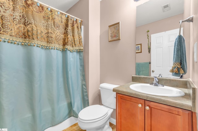 239 Walcott Dr, Lyman, SC 29365 - bathroom featuring toilet, vanity, and tile patterned floors