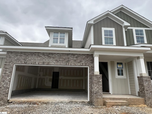 59 Hensley Rd Unit 63, Greenville, SC 29607 - craftsman inspired home with dirt driveway, brick siding, an attached garage, and board and batten siding
