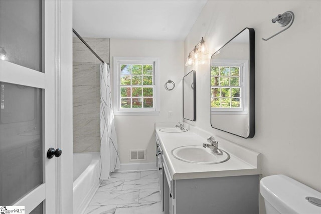 408 Bent Creek Dr, Greer, SC 29650 - full bathroom featuring marble look tiles, toilet, shower / bath combo with shower curtain, double vanity, and baseboards