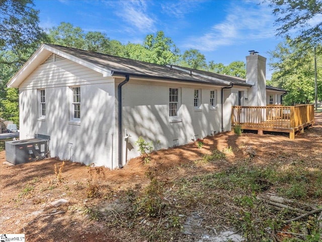 408 Bent Creek Dr, Greer, SC 29650 - rear view of house with a chimney, a deck, and central AC