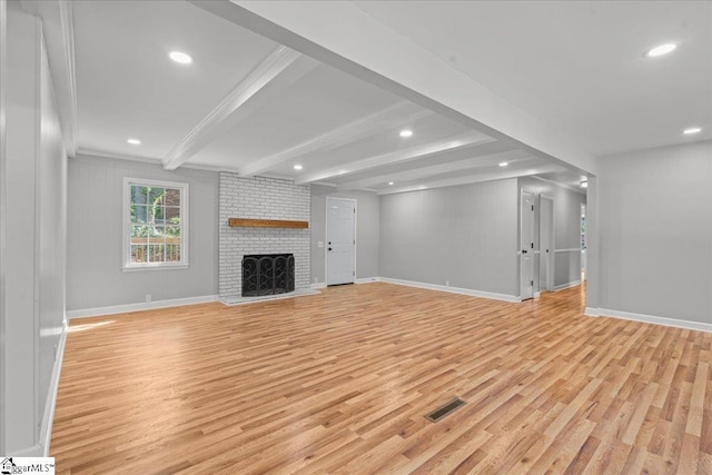408 Bent Creek Dr, Greer, SC 29650 - unfurnished living room with light wood-type flooring, baseboards, beam ceiling, recessed lighting, and a fireplace