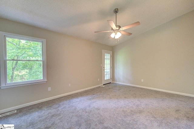 400 Halifax Dr, Greenville, SC 29615 - spare room featuring ceiling fan, carpet floors, baseboards, and lofted ceiling