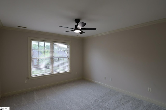 128 Palm Springs Way, Simpsonville, SC 29681 - carpeted spare room featuring ornamental molding, ceiling fan, and baseboards