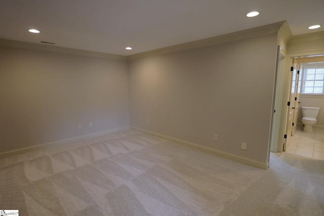 128 Palm Springs Way, Simpsonville, SC 29681 - empty room featuring light colored carpet, ornamental molding, recessed lighting, and baseboards