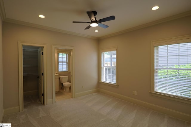 128 Palm Springs Way, Simpsonville, SC 29681 - unfurnished bedroom with light colored carpet, a spacious closet, multiple windows, recessed lighting, and ornamental molding