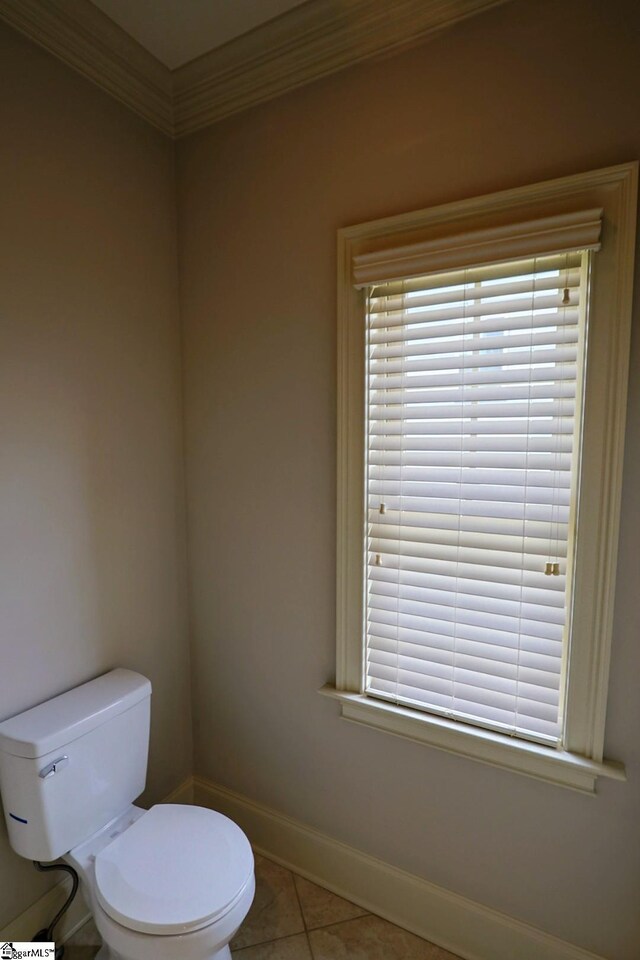 128 Palm Springs Way, Simpsonville, SC 29681 - bathroom featuring toilet, baseboards, tile patterned floors, and ornamental molding