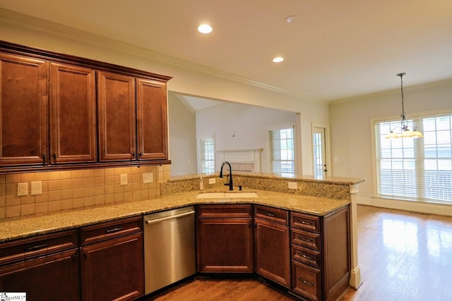 128 Palm Springs Way, Simpsonville, SC 29681 - kitchen with dishwasher, a sink, light wood finished floors, a peninsula, and ornamental molding