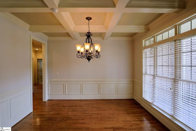 128 Palm Springs Way, Simpsonville, SC 29681 - unfurnished dining area with a chandelier, coffered ceiling, beam ceiling, dark wood finished floors, and a wainscoted wall