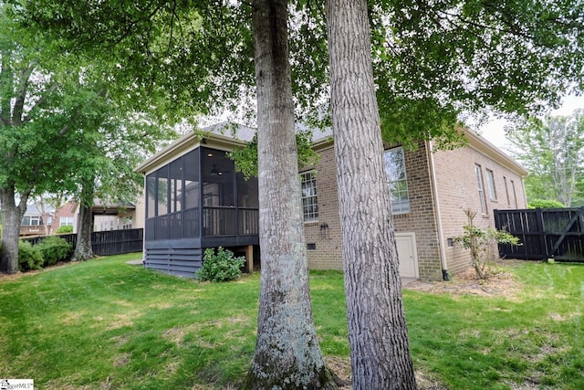 128 Palm Springs Way, Simpsonville, SC 29681 - back of house with brick siding and a sunroom