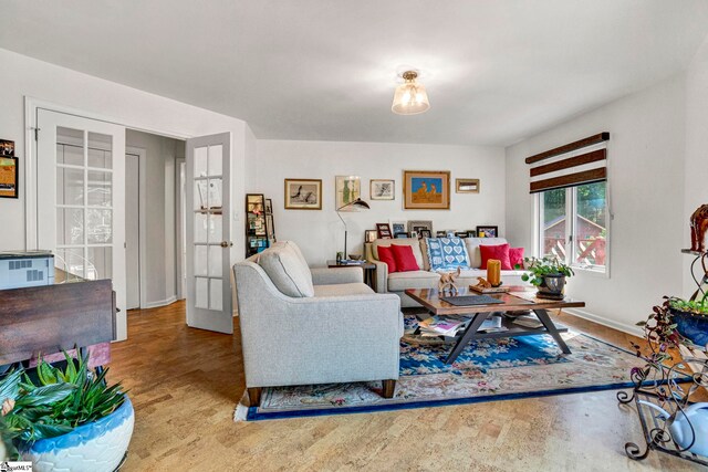 313 Viewmont Dr, Greenville, SC 29609 - living area with french doors, baseboards, and wood finished floors