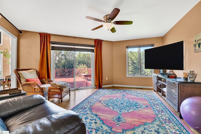 313 Viewmont Dr, Greenville, SC 29609 - living room featuring a ceiling fan, baseboards, and wood finished floors
