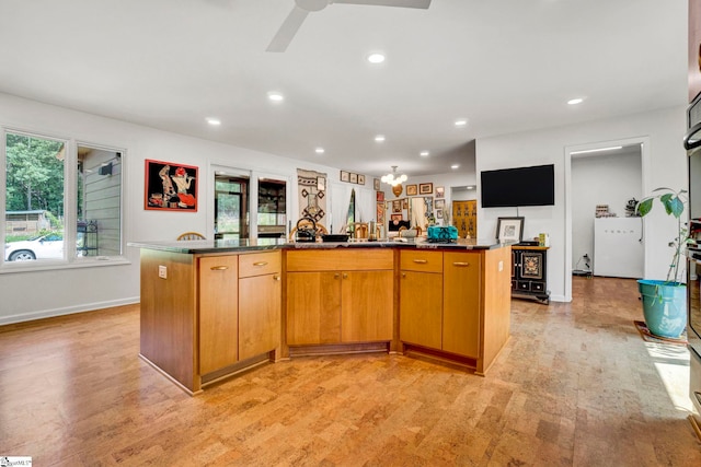 313 Viewmont Dr, Greenville, SC 29609 - kitchen with light wood-style floors, dark countertops, recessed lighting, a ceiling fan, and plenty of natural light
