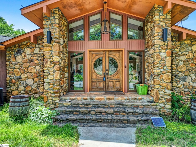 313 Viewmont Dr, Greenville, SC 29609 - entrance to property with board and batten siding and central air condition unit