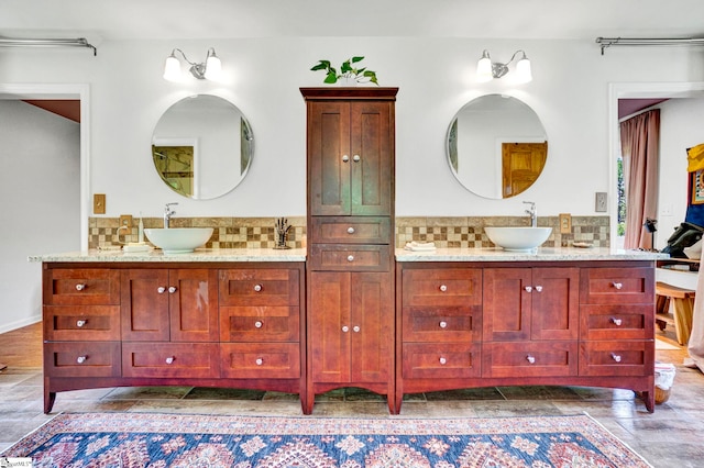 313 Viewmont Dr, Greenville, SC 29609 - full bath with backsplash, vanity, and wood finished floors