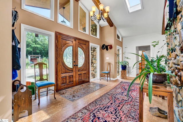 313 Viewmont Dr, Greenville, SC 29609 - foyer featuring a chandelier, a towering ceiling, and a skylight