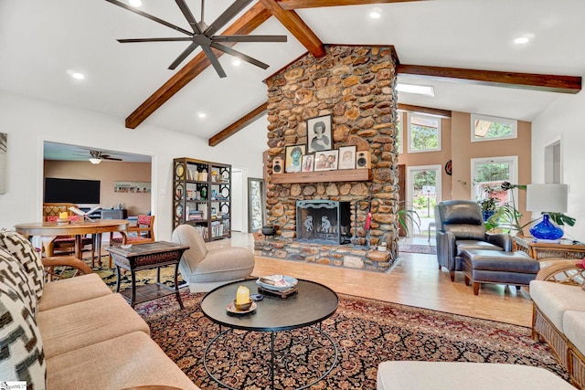 313 Viewmont Dr, Greenville, SC 29609 - living area with a ceiling fan, beamed ceiling, a stone fireplace, high vaulted ceiling, and recessed lighting