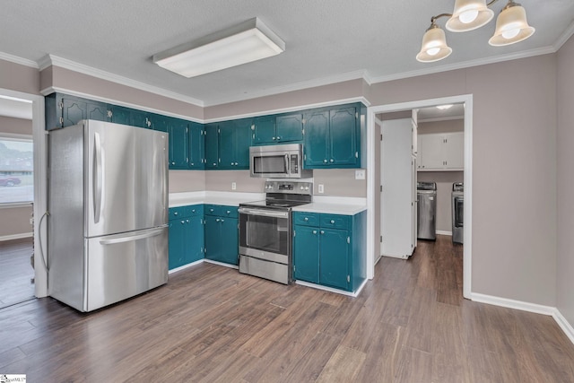 140 Greenbriar Dr, Gaffney, SC 29341 - kitchen with appliances with stainless steel finishes, independent washer and dryer, dark wood-type flooring, light countertops, and blue cabinets