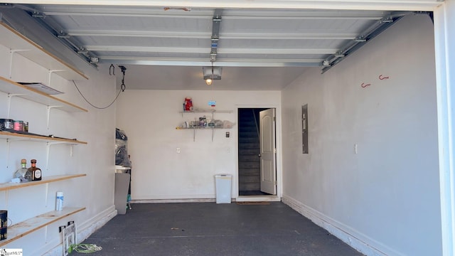 128 Adger Rd, Pendleton, SC 20670 - garage featuring baseboards and a garage door opener