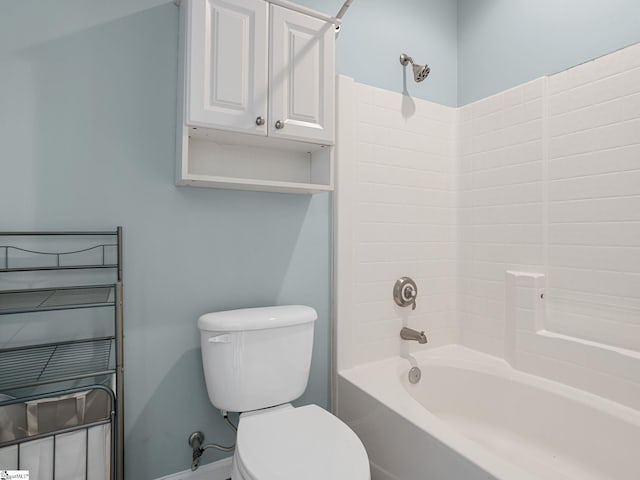 full bath with toilet, shower / bath combination, and baseboards