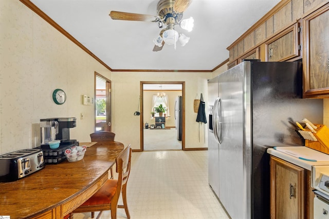 11 Crestview Ct, Piedmont, SC 29673 - kitchen featuring stainless steel fridge with ice dispenser, a chandelier, freestanding refrigerator, ornamental molding, and ceiling fan