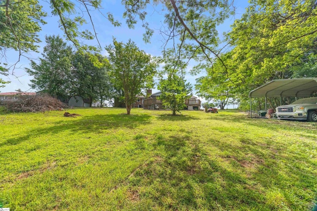 11 Crestview Ct, Piedmont, SC 29673 - view of green lawn featuring a carport