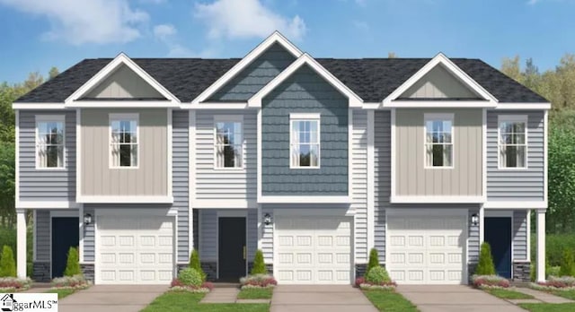 1222 Forestbrook Ln, Spartanburg, SC 29303 - view of front of property with an attached garage, board and batten siding, and driveway
