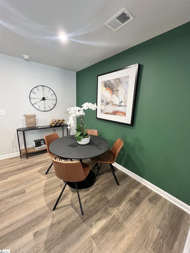 1222 Forestbrook Ln, Spartanburg, SC 29303 - dining space featuring wood finished floors and baseboards