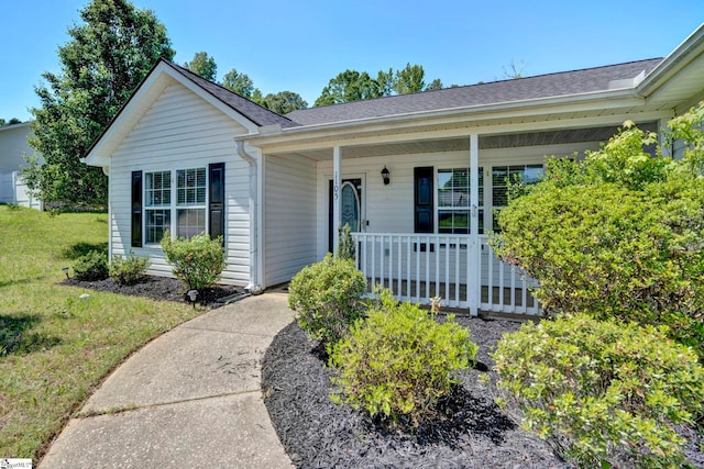 1105 Autumn Leaf Ln, Fountain Inn, SC 29644 - ranch-style home with a porch and roof with shingles