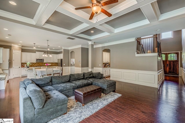 112 Murdock Ln, Greer, SC 29651 - living room featuring arched walkways, a ceiling fan, beam ceiling, crown molding, and hardwood / wood-style flooring
