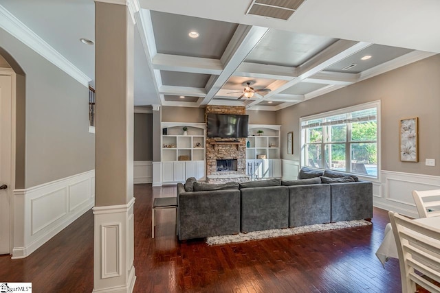 112 Murdock Ln, Greer, SC 29651 - living room with a ceiling fan, dark wood finished floors, arched walkways, beamed ceiling, and a fireplace