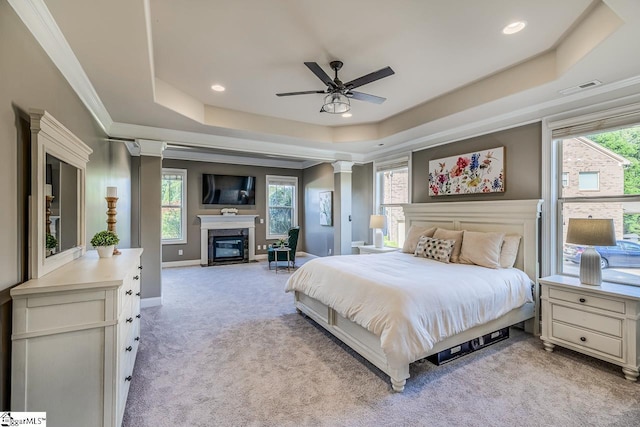 112 Murdock Ln, Greer, SC 29651 - bedroom with a raised ceiling, light colored carpet, a high end fireplace, baseboards, and crown molding