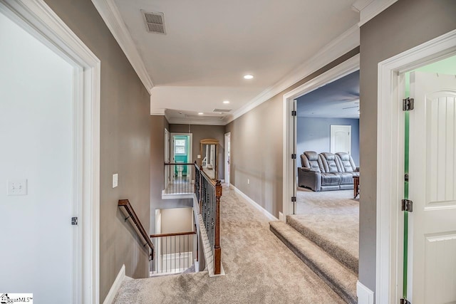 112 Murdock Ln, Greer, SC 29651 - hall featuring an upstairs landing, carpet floors, baseboards, attic access, and crown molding