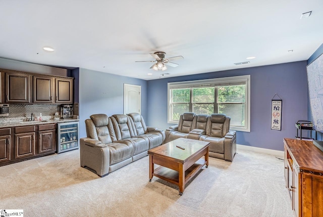 112 Murdock Ln, Greer, SC 29651 - living area with bar with sink, light colored carpet, ceiling fan, wine cooler, and recessed lighting
