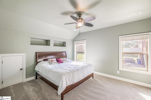 112 Murdock Ln, Greer, SC 29651 - carpeted bedroom with baseboards, multiple windows, lofted ceiling, and ceiling fan