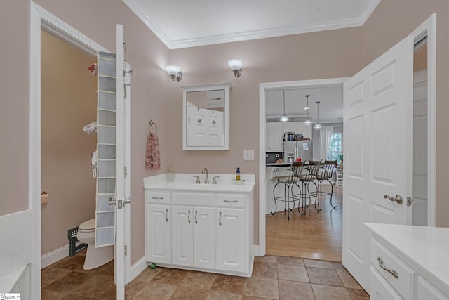 317 Hunter Rd, Fountain Inn, SC 29644 - bathroom with ornamental molding, vanity, tile patterned flooring, and baseboards