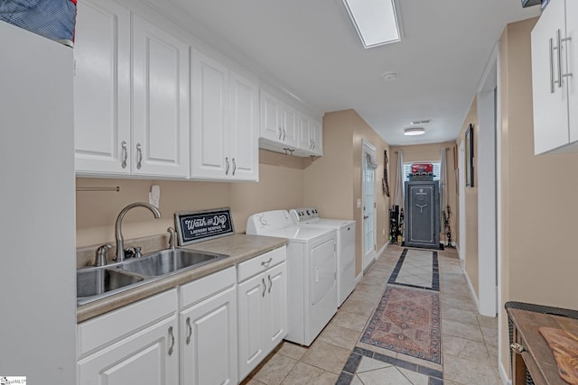 317 Hunter Rd, Fountain Inn, SC 29644 - laundry room with separate washer and dryer, inlaid floor details, and baseboards